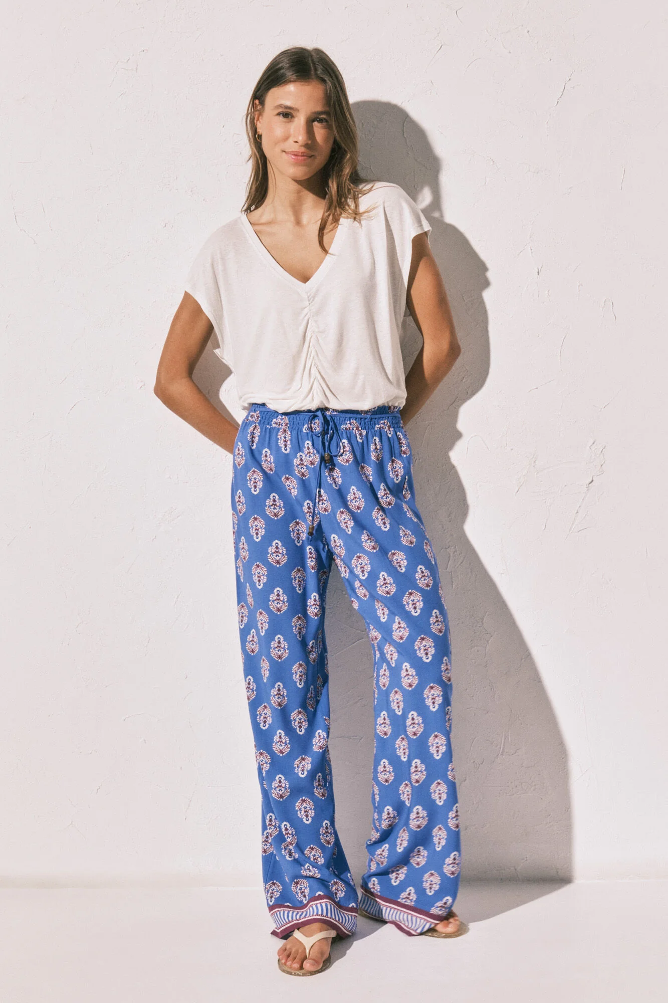 Long trousers with blue logo print
