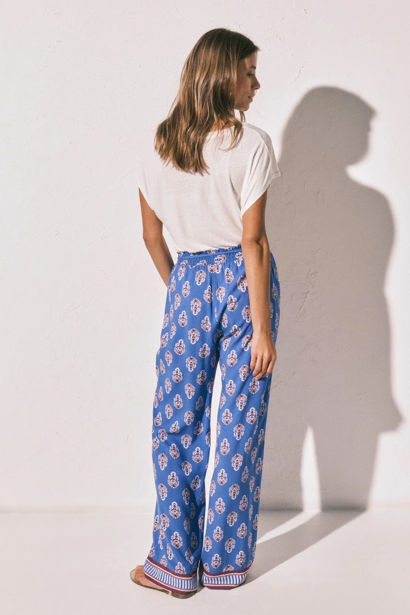 Long trousers with blue logo print - Image 4